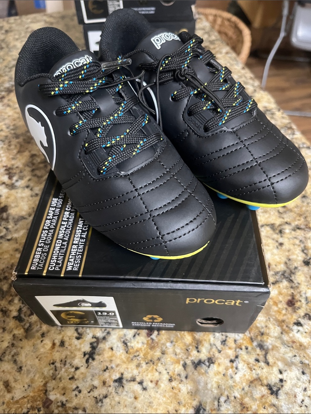 Puma Kids Black Sneakers with Yellow and Blue Accents